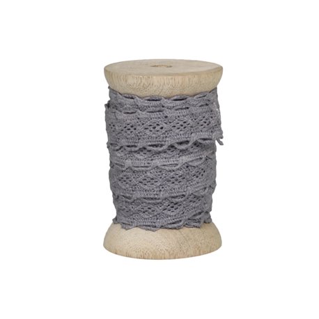 Lace ribbon on wooden spool antique grey